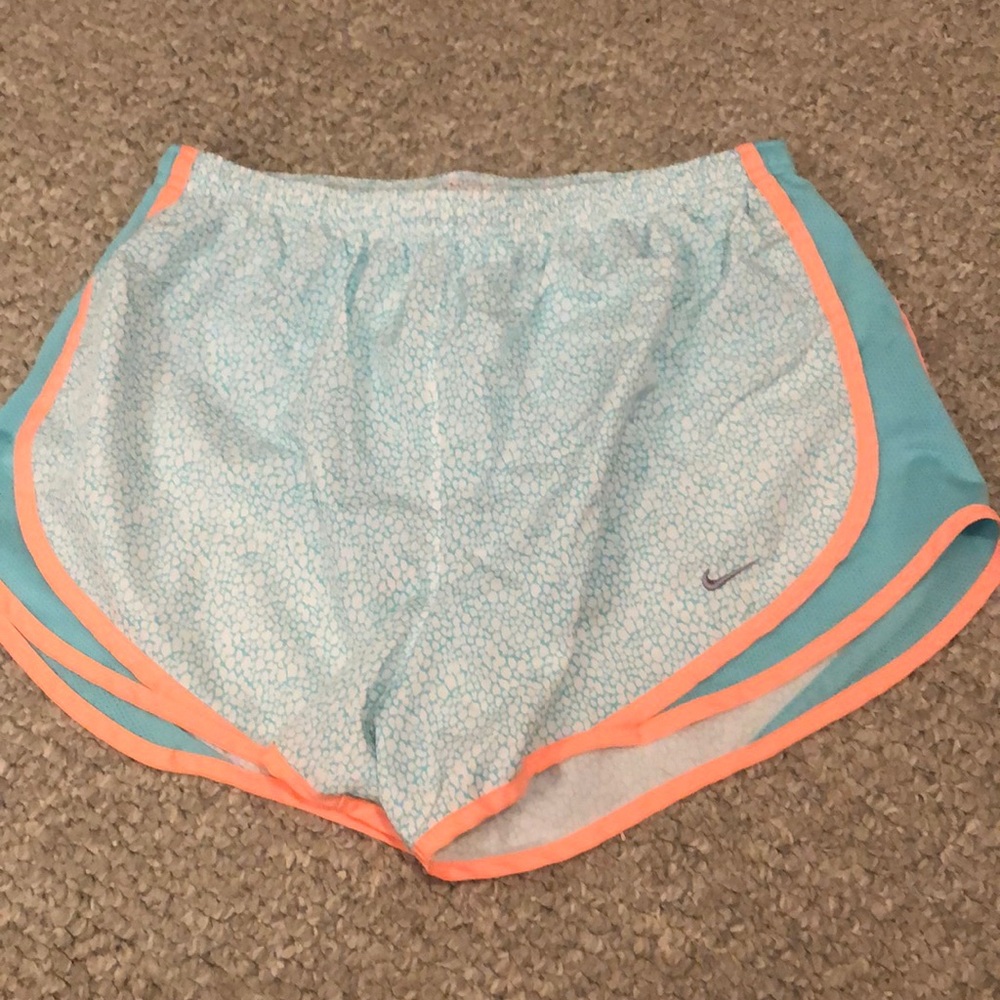 neon blue and orange nike shorts